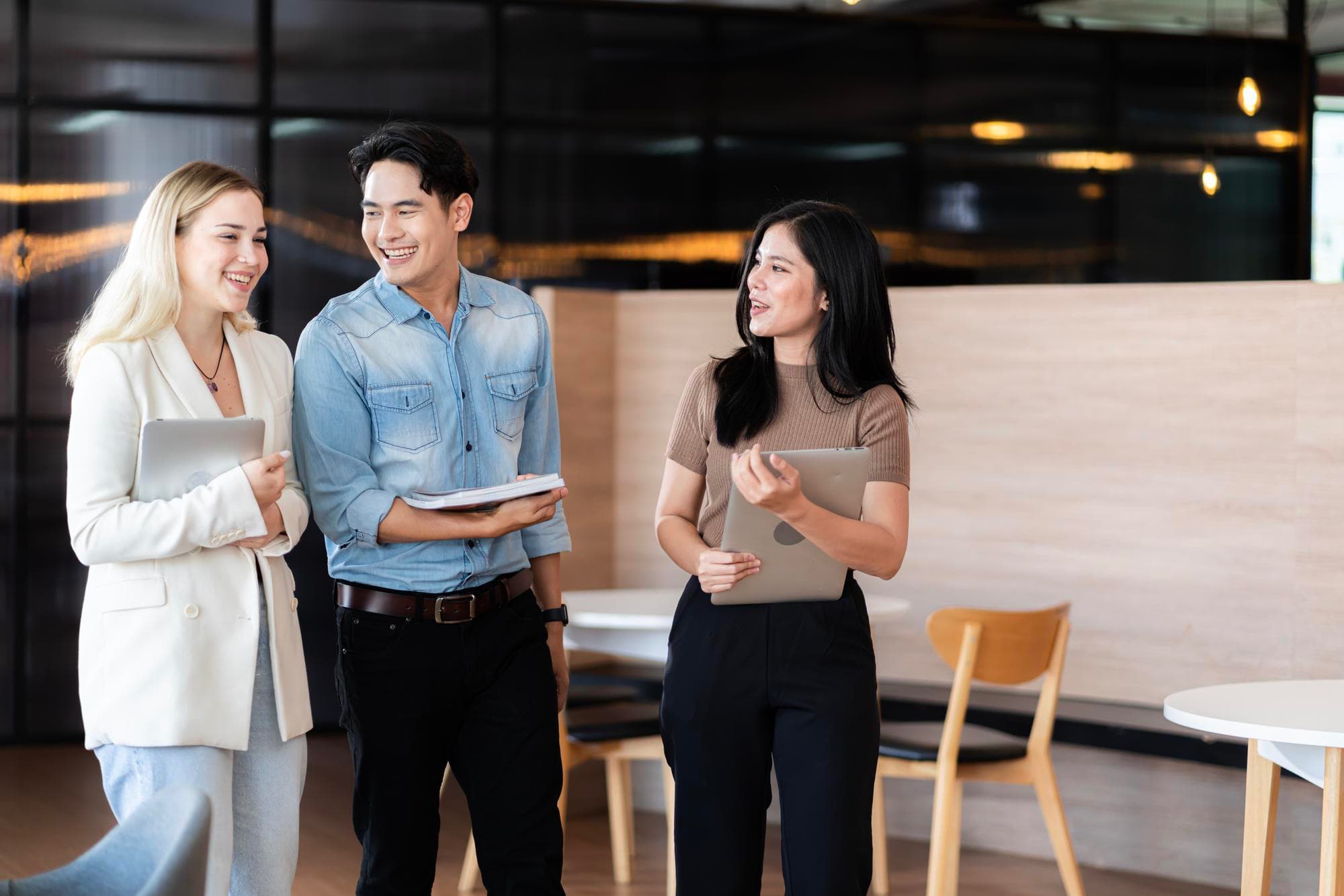 Modern office environment with professionals collaborating